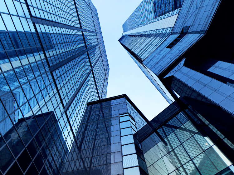 Modern glass building illustrating architectural applications discussed in the Levasil colloidal silica article